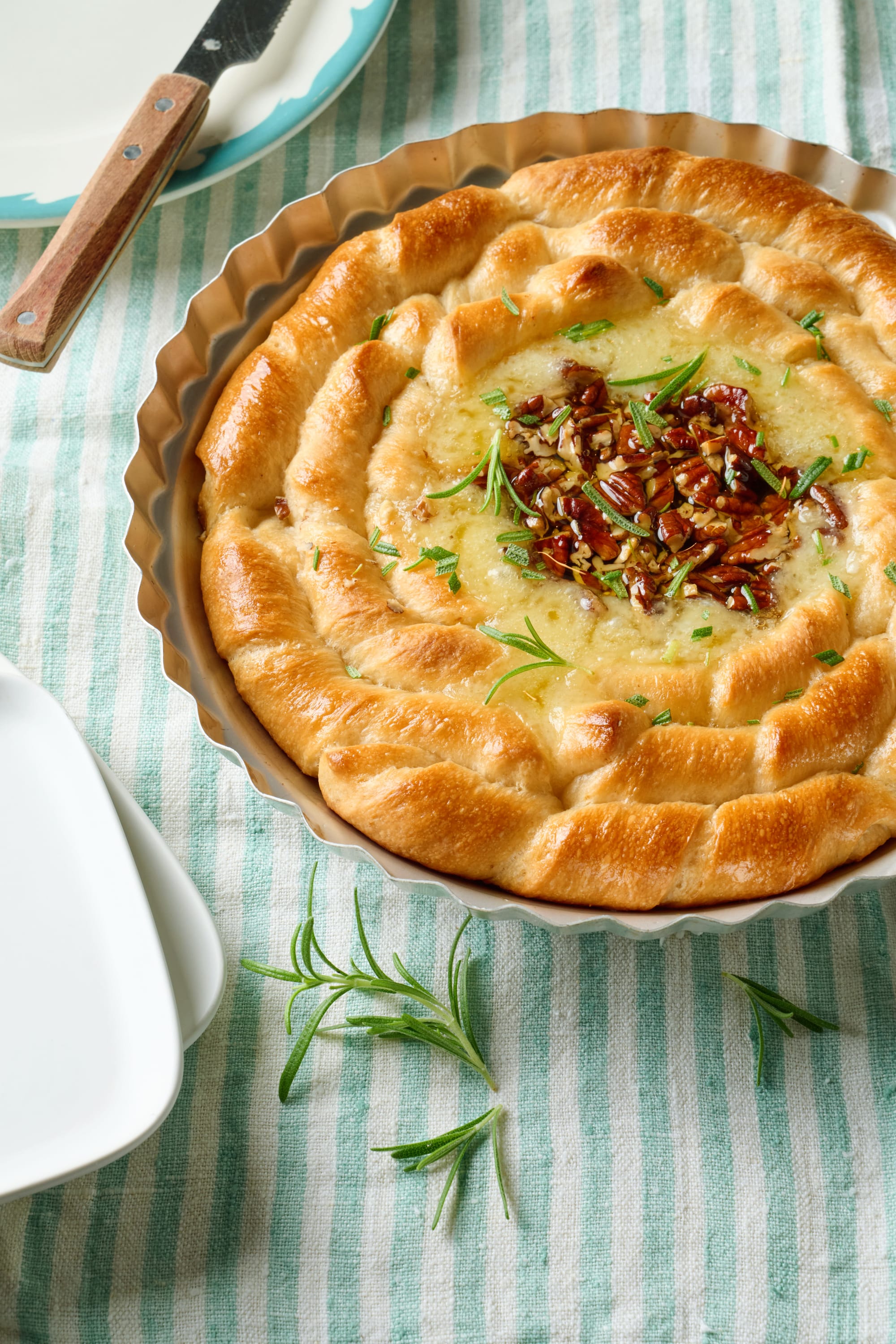 Praline-Topped Brie “Flower” with Breadstick Twists