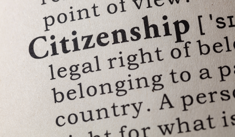 Photo of the word citizenship with the definition in the dictionary.