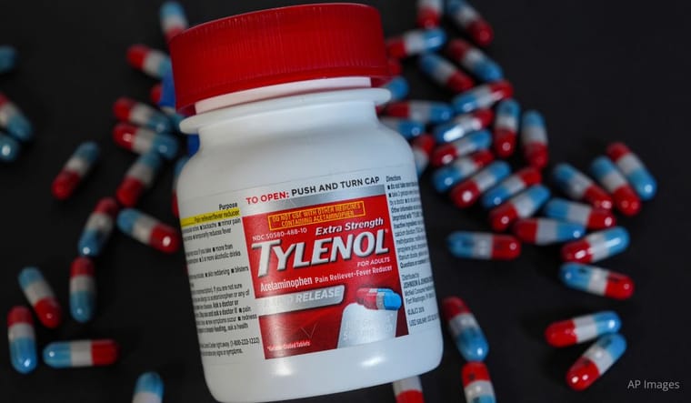 Tylenol bottle and pills. AP Images.