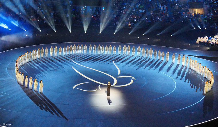 UN Messenger of Peace Charlize Theron speaks at the Olympic Opening Ceremony