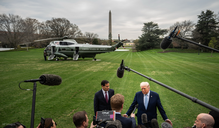 President Trump and Secretary of State Marco Rubio talking to reporters