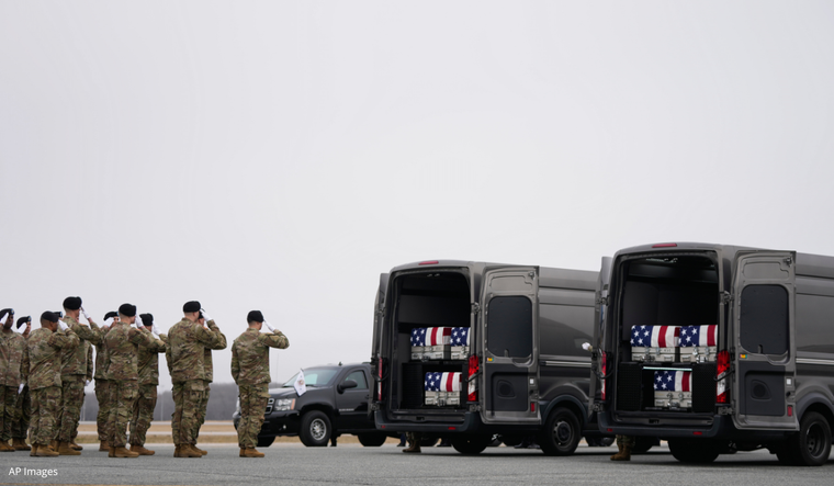 Army salute vans with remains of U.S. Army Reserve soldiers